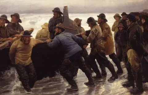 Fishermen Launching A Rowing Boat