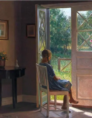 Interno con una ragazza che guarda il giardino 1920