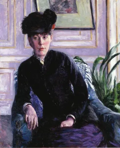 Portret van een jonge vrouw in een interieur, ca. 1877