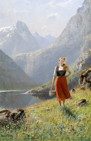 A Young Girl With A Basket In The Mountains