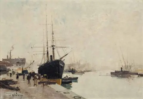 Ein Schiff an der Hafenmauer