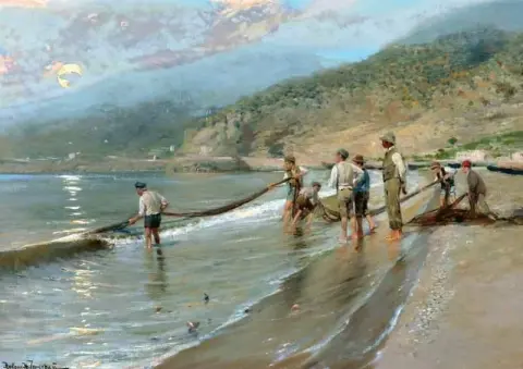 Escena de la costa sur con pescadores sacando la pesca a tierra