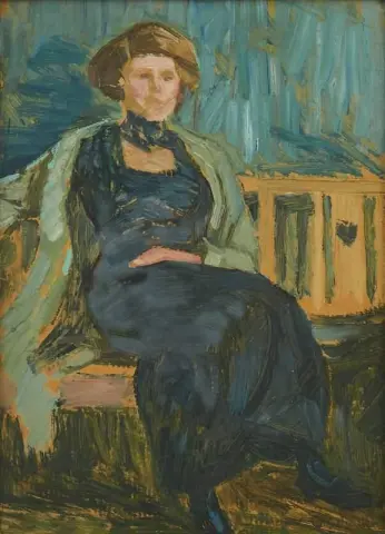 Sittande Kvinna