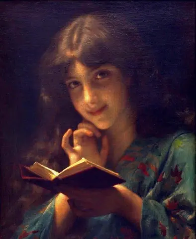 Young Girl Reading A Book