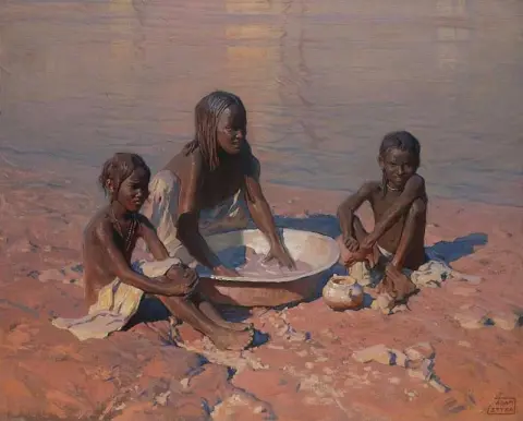 Madre e hijos junto al Nilo