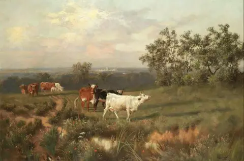Cattle Grazing With Windsor Castle In The Distance