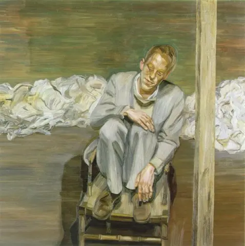 Punatukkainen mies tuolilla 1962